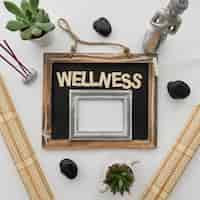 Free photo wellness composition with lettering and chalkboard