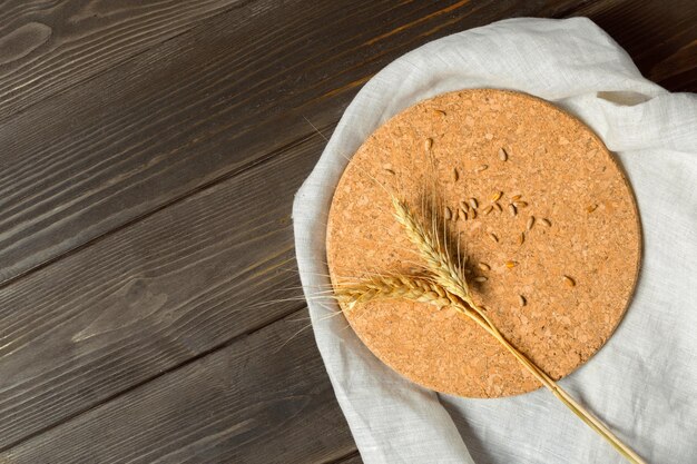 Wheat Ears on the Wooden Table