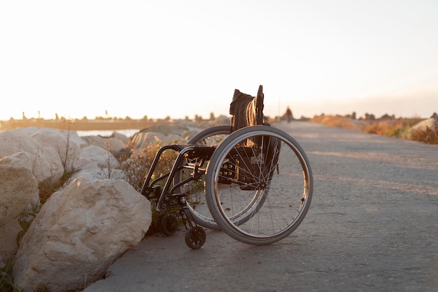 Free Photo wheelchair lifestyle concept at beach