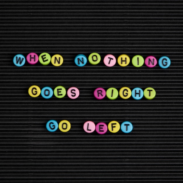 Free Photo when nothing goes right go left beads word typography