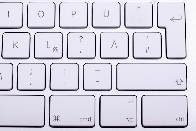 White aluminum keyboard in close up. Technology and communication