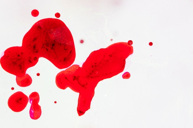 Free Photo white background with abstract blood stains