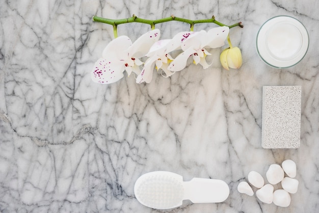 Free Photo white bathroom products on marble surface