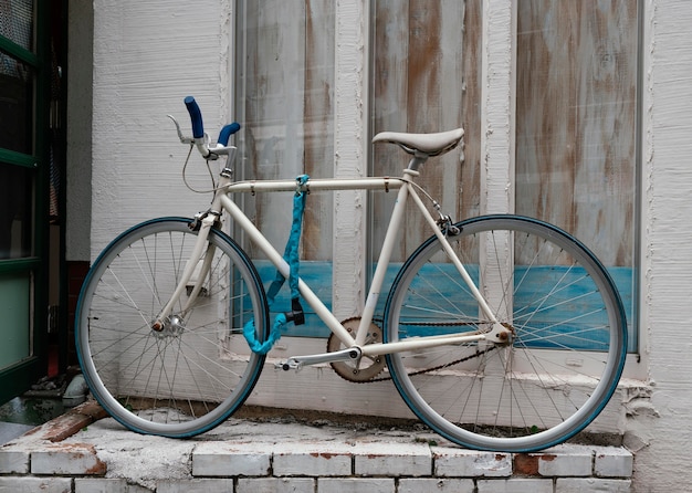 White bicycle with blue details