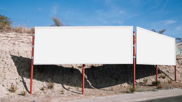 White blank billboard near the road