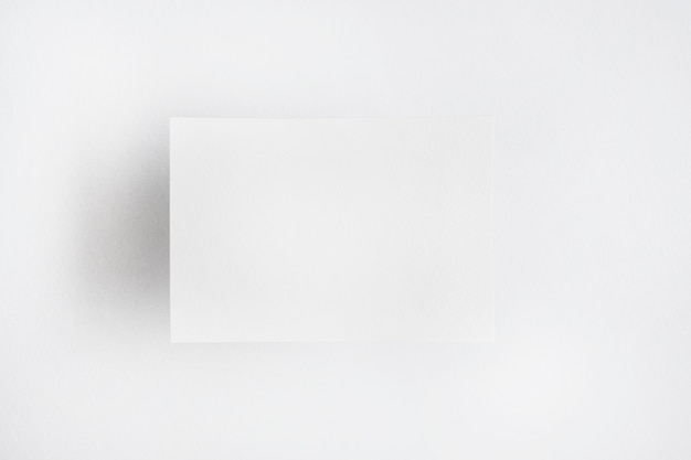 Free photo white blank paper isolated over plain background