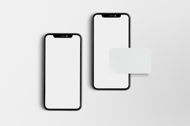 White blank phone and business card on white background