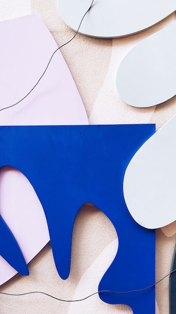 White and blue paper cutouts