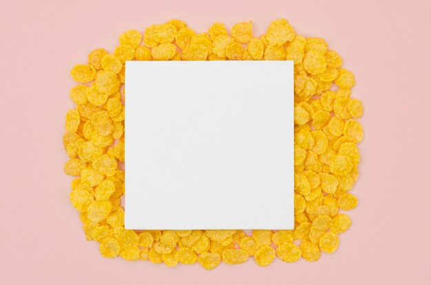 White card with copy space surrounded by cornflakes