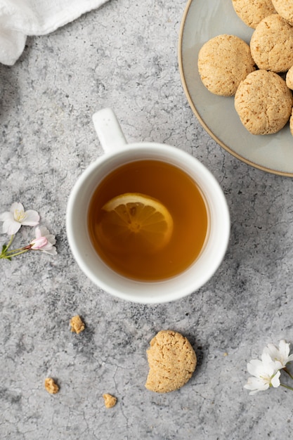 White ceramic mug with yellow liquid inside