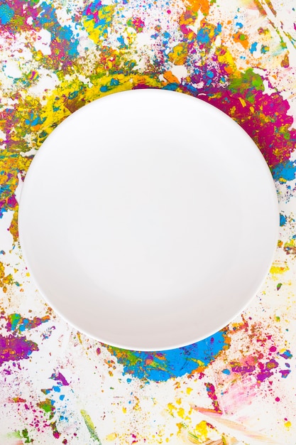 Free photo white circle on blurs of different bright dry colors