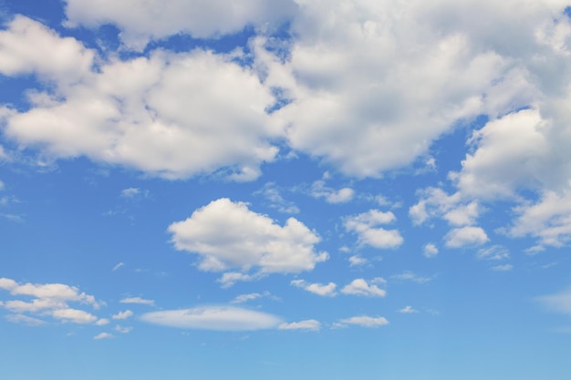 White clouds in the blue sky on sunny day