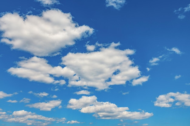 White clouds in the blue sky on sunny day