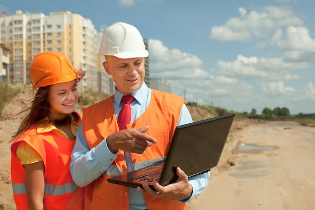 White-collar workers works on the building site