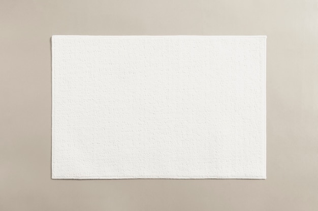 Free Photo white cotton bathroom mat on the floor