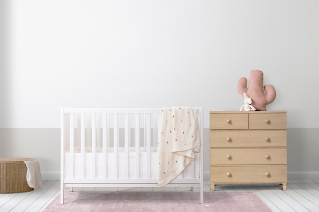 Free Photo white crib in a minimal nursery room