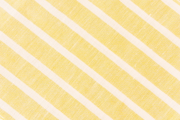 Free photo white diagonal line on yellow fabric