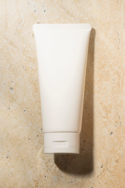 Free photo white face cream tube, unlabeled beauty product