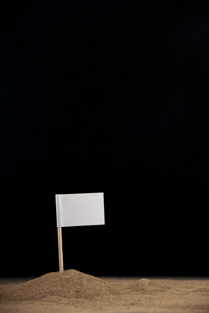 White flag on moon on the dark surface