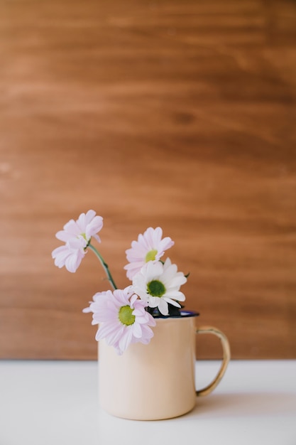 White flowers in mug