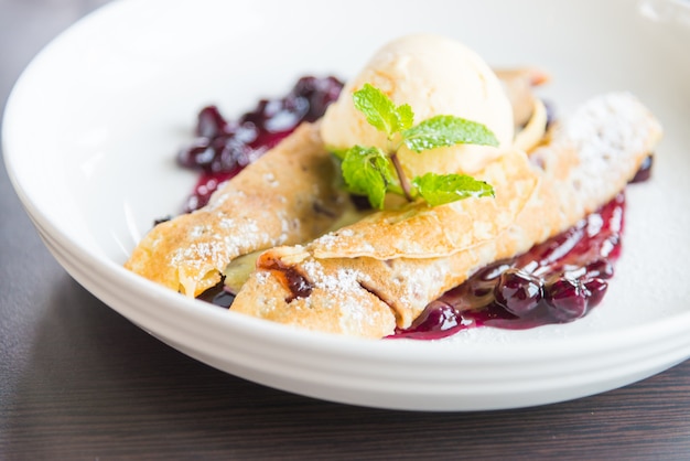 Free Photo white fresh pancake blueberry raspberry cream