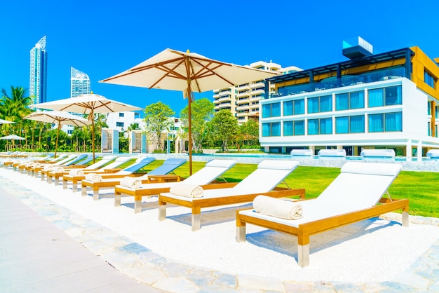 White hammocks with umbrellas