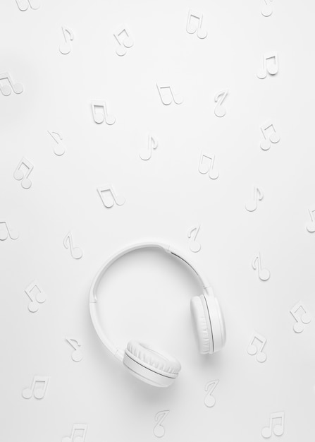 Free Photo white headphones with musical notes