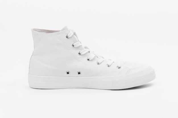 Free photo white high top sneakers unisex footwear fashion