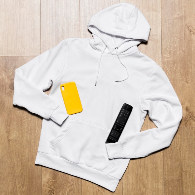 Free Photo white hoodie with remote