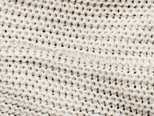 Free photo white knitted fabric background