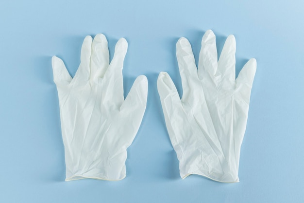 Free Photo white latex gloves to prevent coronavirus contamination