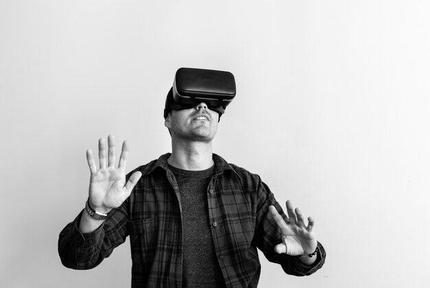 White man experiencing virtual reality with VR headset