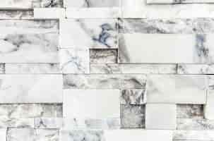 Free photo white marble brick wall textured wallpaper