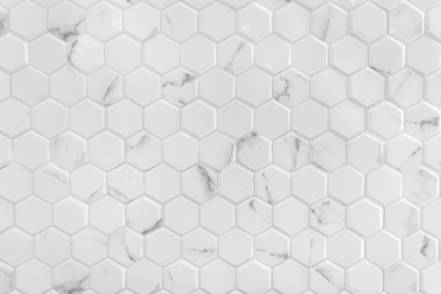 Free Photo white marble wall with hexagon pattern