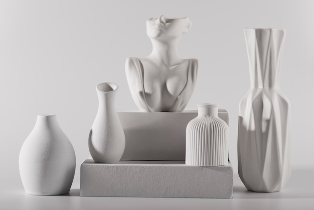 Free photo white modern vases assortment