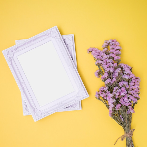 White ornamental frames on yellow background