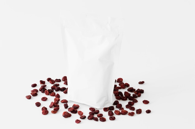 White package with liquid between dried fruits 