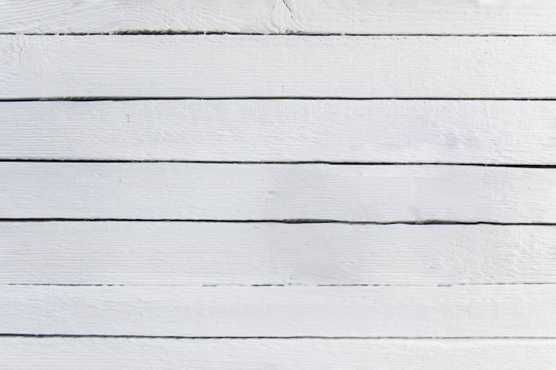 Free photo white painted wooden textured plank backdrop