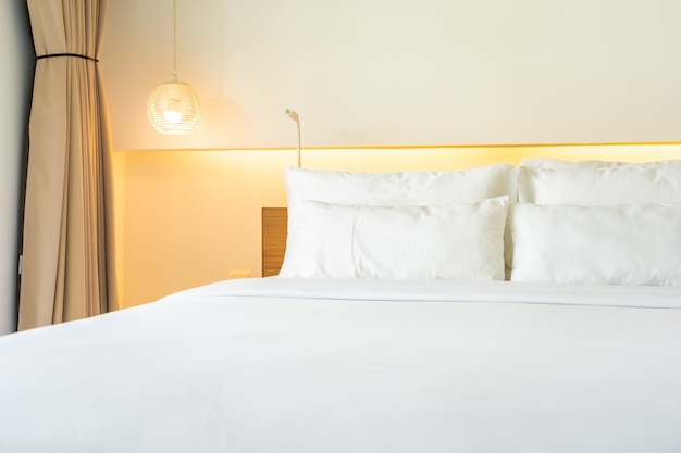 White pillow and blanket on bed decoration interior of bedroom