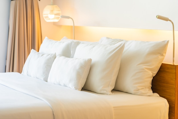 White pillow and blanket on bed decoration interior of bedroom