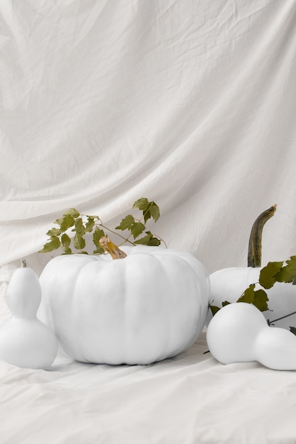 White pumpkins on cloth arrangement