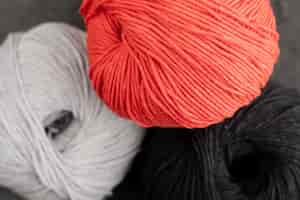 Free photo white, red and black wool yarn