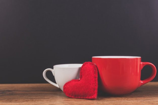 Free photo white and red cup with a teddy heart