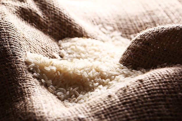 White rice grains on sack cloth