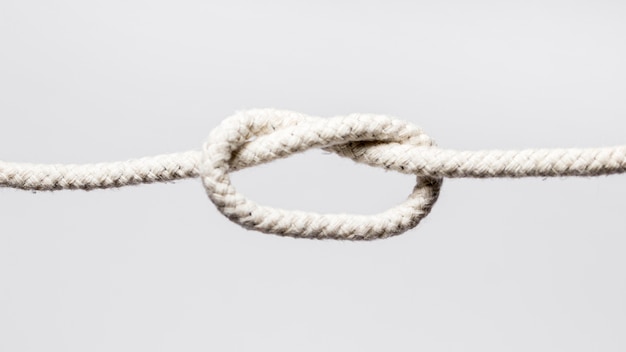 Free photo white ropes with overhand knot