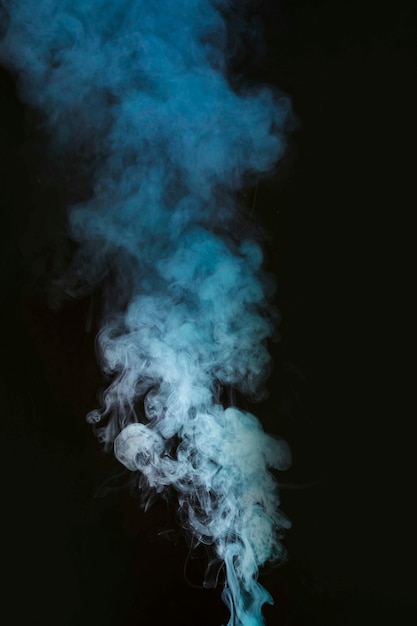 Free Photo white smoke fumes on black backdrop