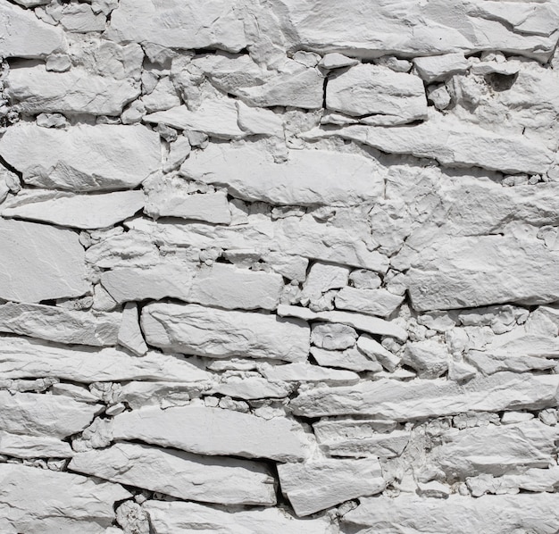 Free photo white stone wall texture background