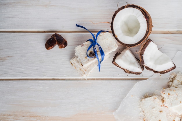 Free Photo white sweets on light wooden table