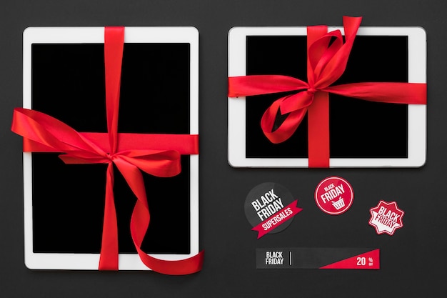 Free Photo white tablets with ribbons near sale stickers 