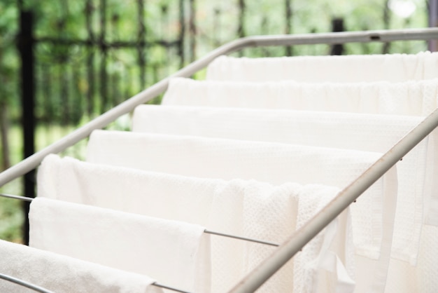 White towels drying on clotheshorse